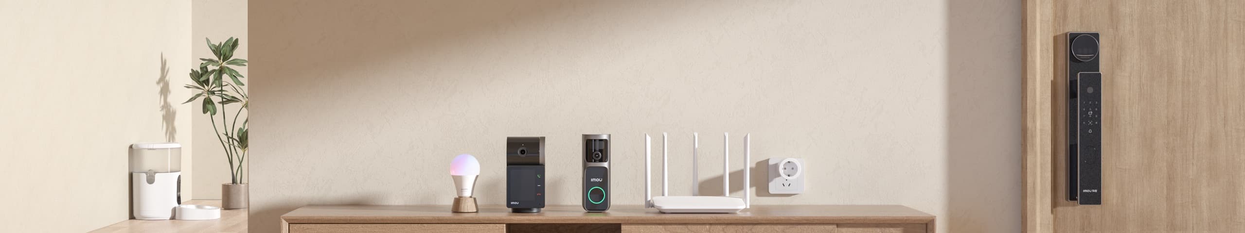 IMOU smart-home lineup on a living-room console